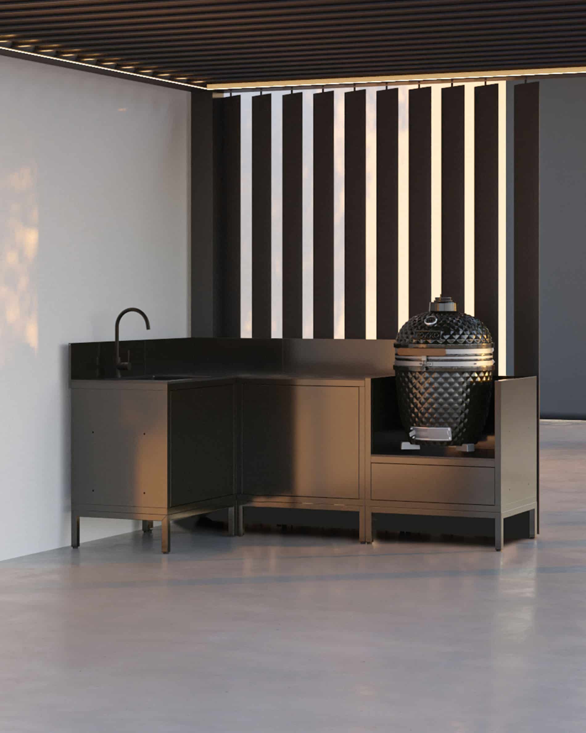 Cocina sobre pilotes con kamado, configuración en esquina negra bajo pérgola, muebles cerrados y encimera integrada.