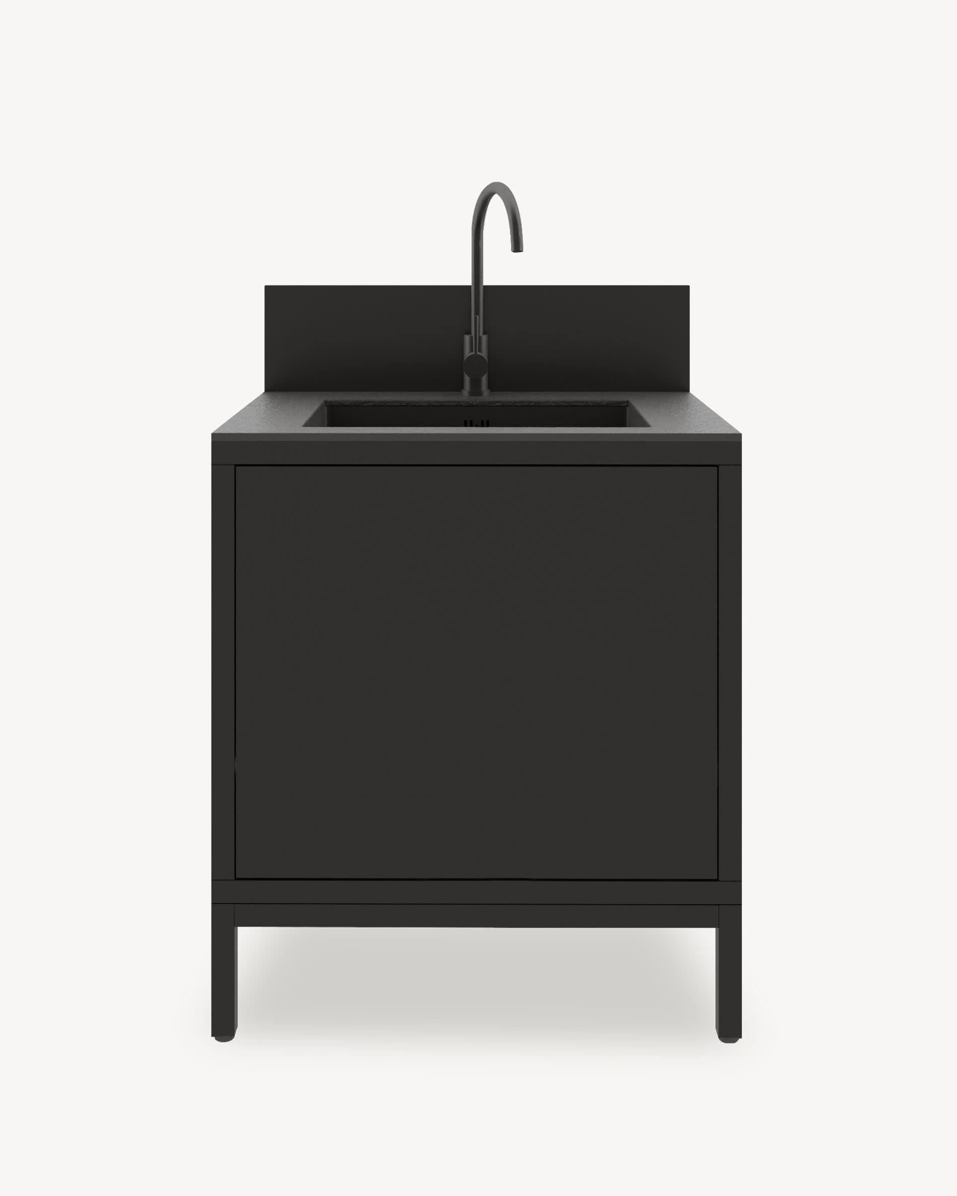Módulo de cocina pilotis con fregadero integrado, mueble negro con almacenamiento cerrado, encimera oscura y panel protector integrado.